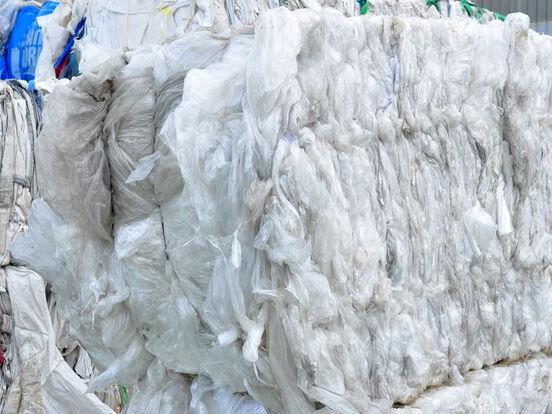 Baled PE film waste used as raw material for PE film washing line